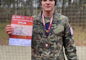 Adam Tosik na podium w w zawodach European Cup of Amateur MMA